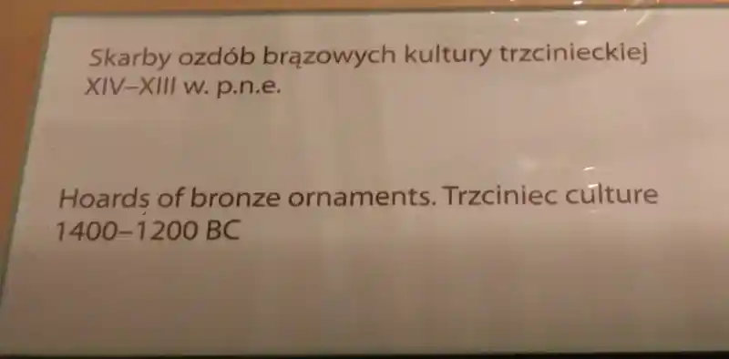 Four-point cross on a bronze ornament